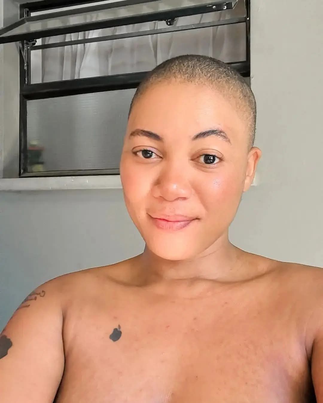 Thenjiwe T , 38